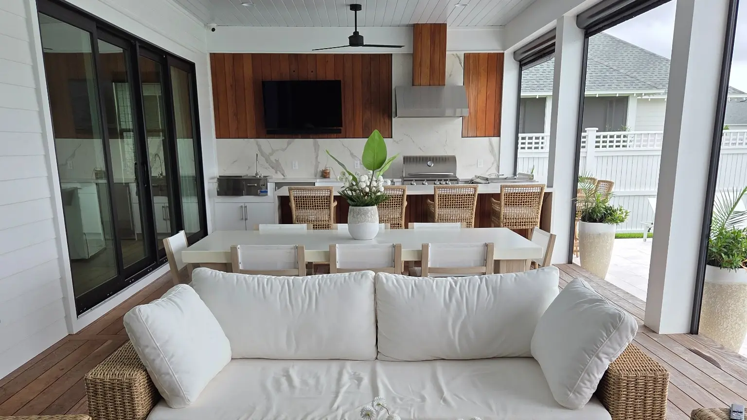 Watersound outdoor kitchen, dining and lounge cared for by The Fifth Room on 30A